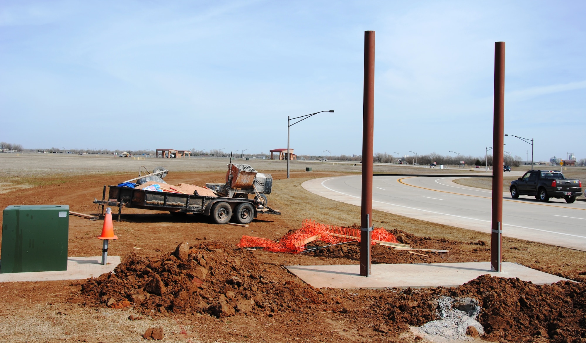 Foundation is laid for two of Vance’s five new full-color light-emitting diode marquees. The main gate entrance is one of three new locations to be constructed this month. (U.S. Air Force photo/2nd Lt. Christopher Buzzetta)