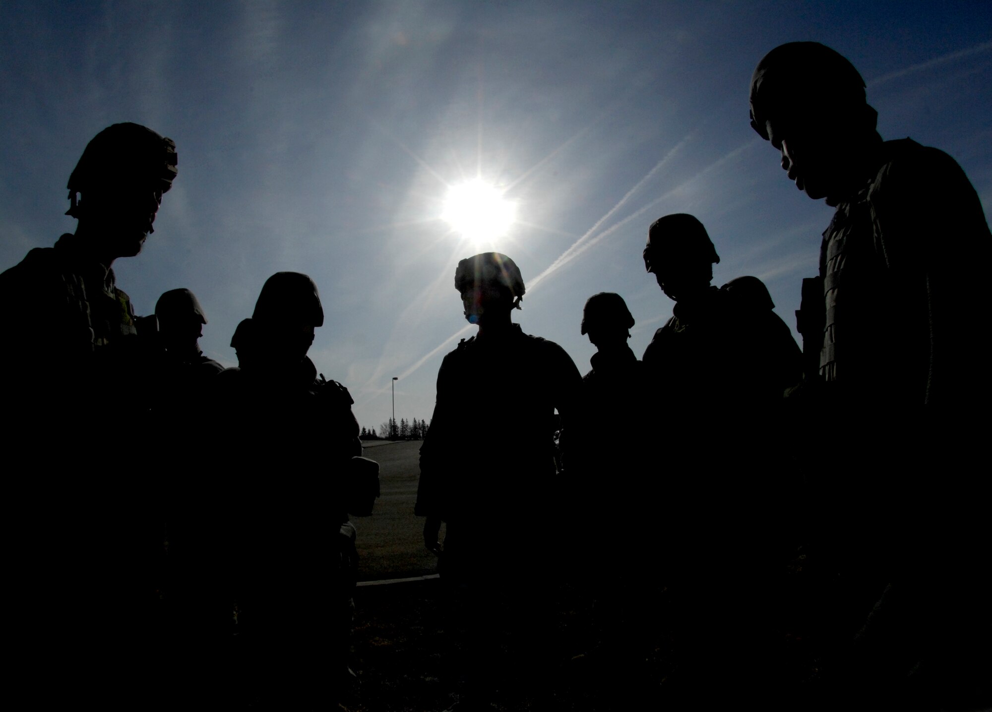 MINOT AIR FORCE BASE, N.D. – Members of the 5th Security Forces Squadron assemble prior to entering the McAdoo Fitness Center in response to the major accident response exercise at Minot AFB March 26. Exercises like this MARE prepare base personnel for possible real-world situations as well as testing communication and emergency procedures. (U.S. Air Force photo by Senior Airman Jesse Lopez)