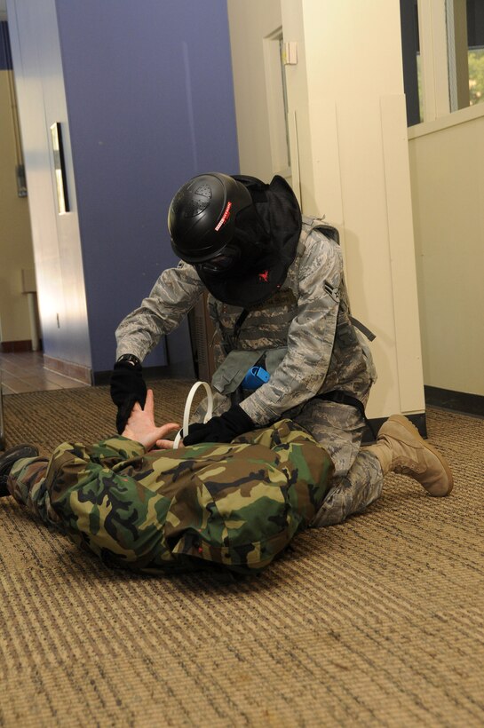 Members of the 158th Fighter Wing Security Forces conduct Military Operations on Urban Terrain (MOUT) in Essex, VT, March 9, 2010. (U.S. Air Force photo by SSgt Daniel DiPietro).