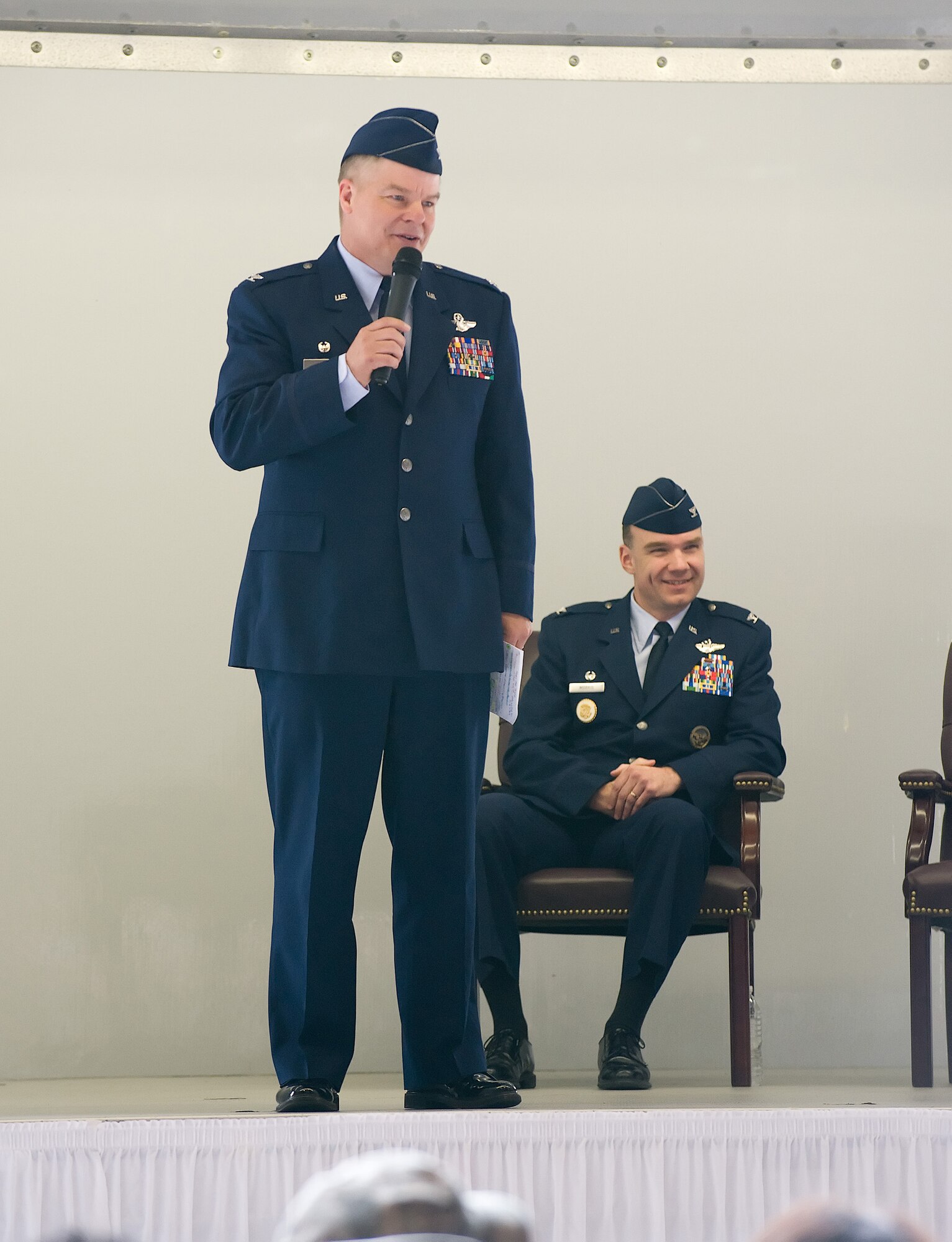 Col. David Hafer Jr., incoming 436th Operations Group commander, speaks to the crowd at the Change-of-Command ceremony in Hangar 706 March 25. He told the crowd that he was honored to be their new commander. (U.S. Air Force photo/Jason Minto)