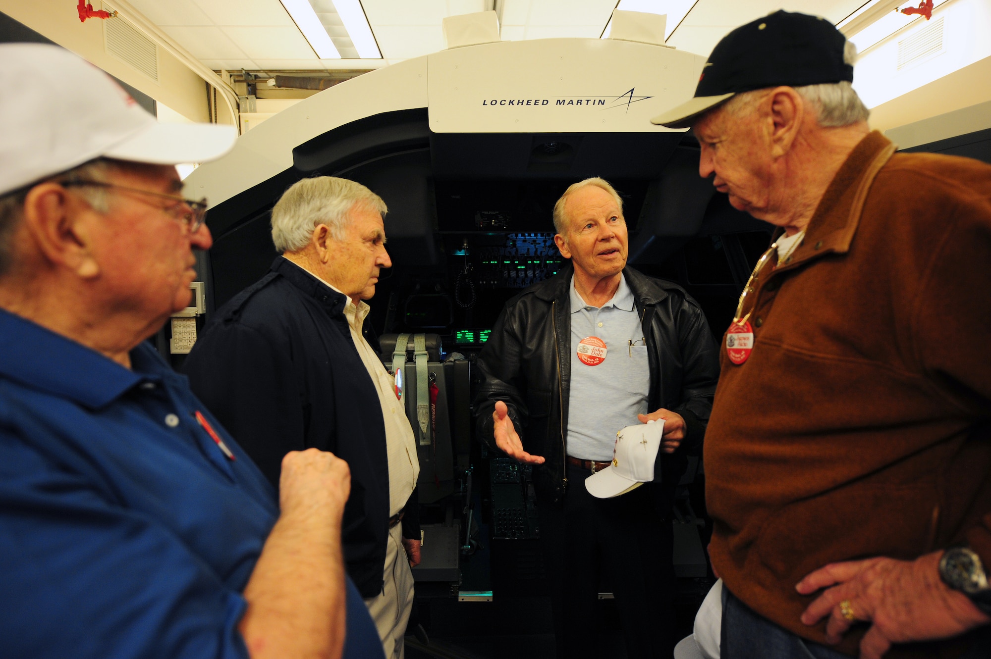 Retired Four Horsemen members (from left) Lt. Col. Bill Hatfield, Col. Billie Mills, Col. John Dale and Lt. Col. James Akin, visited the base March 26 as part of the 815th Airlift Squadron reunion. The crew members took a flight in a C-130 simulator and 'flew' together for the first time in over 50 years. The Four Horsemen are a C-130 demonstration team founded in 1957. (U.S. Air Force photo by Senior Airman Steele C. G. Britton)