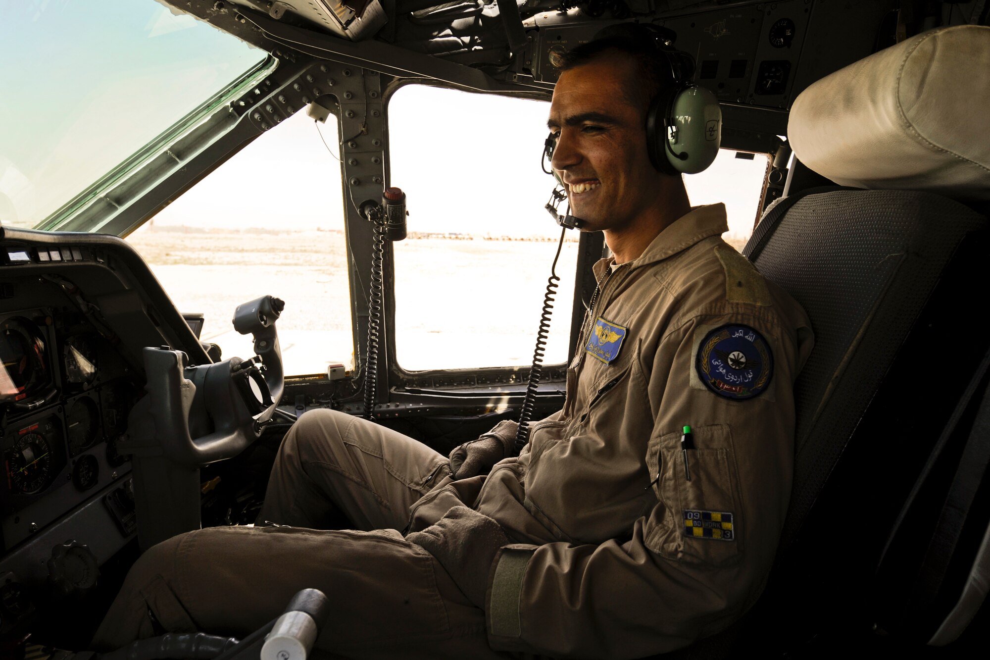 First Lieutenant Faiz M. Ramaki, an Afghanistan National Army Air Corps C-27 pilot sits in the cock-pit after flying the first operational mission from Kabul International Airport to Kandahar Airfield, March 24, 2010. He is the first Afghan pilot to graduate from the nine-month U.S. pilot training course in more than 50 years. (U.S. Air Force photo/Tech. Sgt. Efren Lopez, RELEASED)
