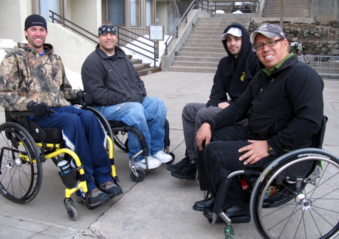 Participants in the 24th annual National Disabled Veterans Winter Sports Clinic say they’re discovering the “Miracle on the Mountainside” in themselves and each other. From left are former Marine Corps Cpl. Joey King, a first-timer at the mountain; Marine Corps Lance Cpl. Kyle Kienitz; Marine Corps Cpl. Noah Currier, another first-timer; and former Army Sgt. Daniel Pelacios, who returned to the clinic after a five-year hiatus to enjoy the camaraderie. DoD photo by Donna Miles