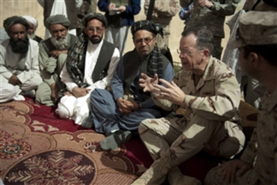 Chairman of the Joint Chiefs of Staff Adm. Mike Mullen, U.S. Navy, holds a shura with Afghan leaders in Marjah, Afghanistan, on March 30, 2010.  Mullen addressed concerns they may have after the successful removal of Taliban forces following Operation Moshtarak, which took place in February.  