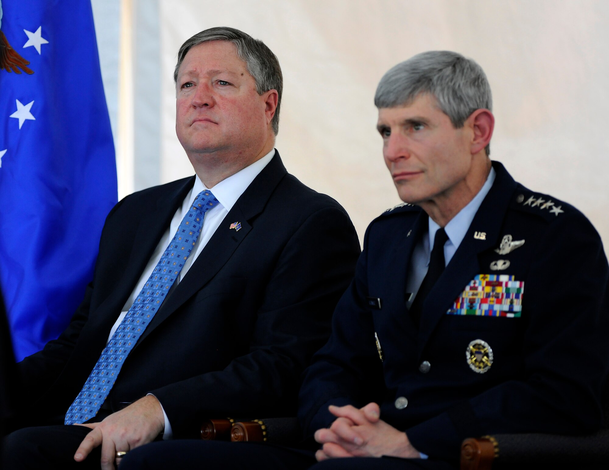 Secretary of the Air Force Michael B. Donley and Air Force Chief of Staff Gen. Norton A. Schwartz listen to Kenneth Fisher, chairman of the board of trustees for the Fisher House Foundation, during the groundbreaking ceremony for the future Fisher House at Dover Air Force Base, Del., May 1. The three leaders co-hosted the ceremony.  When construction is finished, this Fisher House will be unique in that it will provide hospice services to family members awaiting the return of their fallen servicemembers from overseas. (U.S. Air Force photo/Scott M. Ash) 