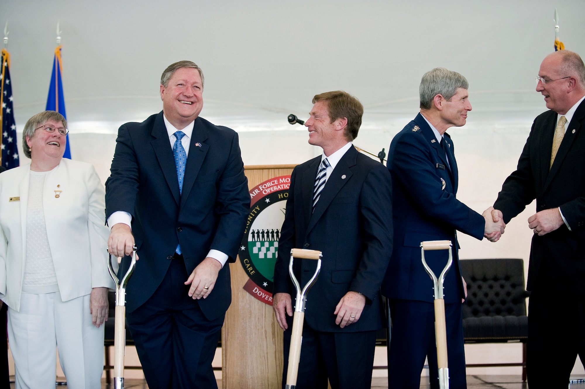 From left to right, Ruth Stonesifer, national president of the Gold Star Mothers of America, Michael B. Donley, secretary of the Air Force, Kenneth Fisher, Fisher House Foundation chairman, Gen. Norton A. Schwartz, Air Force chief of staff, and David Coker, president of the Fisher House Foundation, congratulate one another after the official groundbreaking for the new Fisher House and meditation pavilion for the families of fallen servicemembers, May 1, at Dover Air Force Base, Del. (U.S. Air Force photo/Staff Sgt. Bennie J. Davis III)