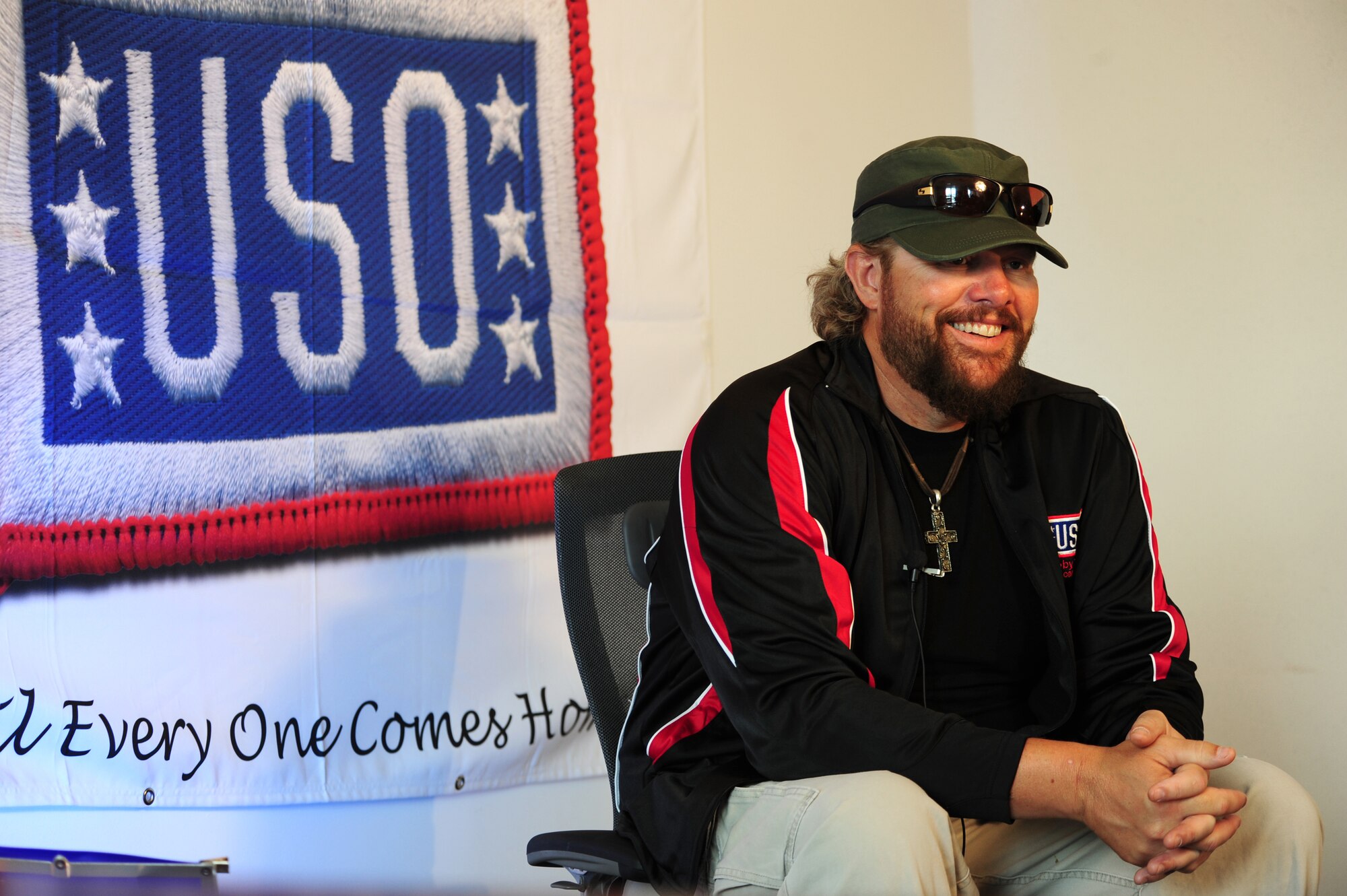 Toby Keith, singer, songwriter and entertainer, reacts to a interview question, at a media event before his free concert, Ramstein Air Base, Germany, May, 1, 2010.  The Toby Keith concert, sponsored by the United Services Organization and Armed Forces Entertainment, was designed to entertain and help boost the morale of troops and their families.  Toby Keith will making stops throughout Germany, Korea and the Persian Gulf during his 14-day country tour.  (U.S. Air Force photo by Staff Sgt. Jocelyn Rich)