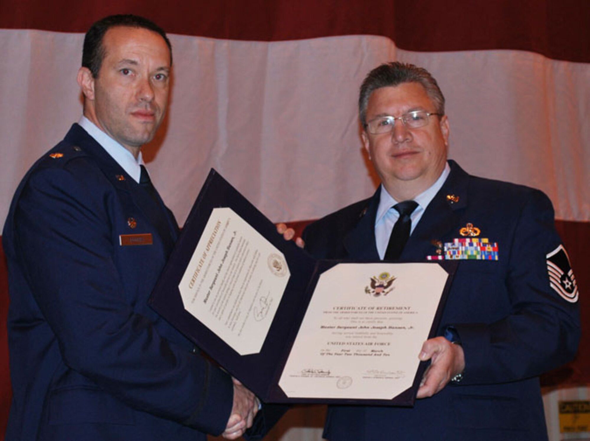 Master Sgt. John Hansen, Jr. retired April 10, 2010. He entered basic training in June 1977 and came to Tinker after aircraft maintenance jet engine school, spending the rest of his career with the 507th. Pictured at left, Lt. Col. Eric Eggers, 507th Aircraft Maintenance Squadron commander, presents Hansen with his retirement certificate.