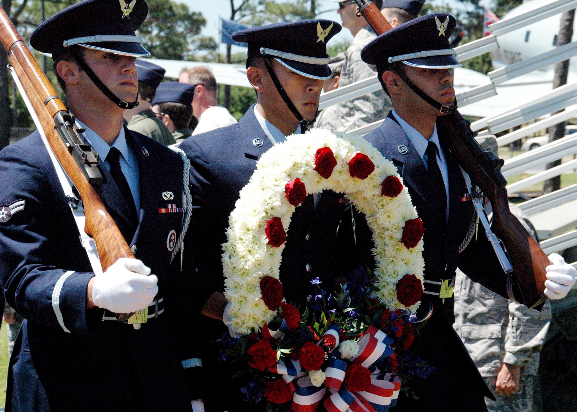 The Hurlburt Field Honor Guard team carries a wreath during a ceremony honoring the 30th anniversary of Operation Eagle Claw April 29. Operation Eagle Claw, conducted April 24, 1980, was a complex mission to rescue U.S. citizens taken hostage in the U.S. embassy in Iran. One of the MC-130E Combat Talons involved in the mission is still active with the 919th SOW at Duke Field, Fla.Tragically, the attempt ended in the death of eight service members. (U.S. Air Force photo/Dan Neely)