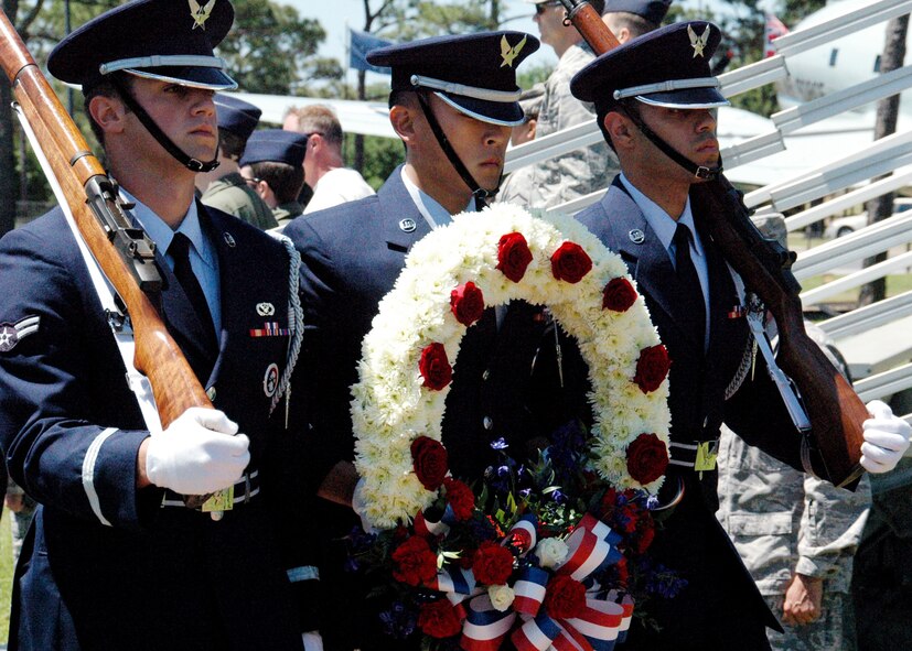 The Hurlburt Field Honor Guard team carries a wreath during a ceremony honoring the 30th anniversary of Operation Eagle Claw April 29. Operation Eagle Claw, conducted April 24, 1980, was a complex mission to rescue U.S. citizens taken hostage in the U.S. embassy in Iran. One of the MC-130E Combat Talons involved in the mission is still active with the 919th SOW at Duke Field, Fla.Tragically, the attempt ended in the death of eight service members. (U.S. Air Force photo/Dan Neely)