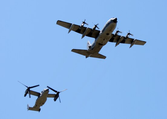 A 919th Special Operations Wing MC-130E Combat Talon and a 1st Special Operations Wing CV-22 perform a flyover during the ceremony honoring the 30th anniversary of Operation Eagle Claw April 29 at Hurlburt Field, Fla.  Eagle Claw was a complex mission to rescue U.S. citizens taken hostage in the U.S. embassy in Iran.  One of the MC-130E Combat Talons involved in the mission is still active with the 919th SOW at Duke Field, Fla. Tragically, the attempt ended in the death of eight service members.  (U.S. Air Force photo/Adam Duckworth.)
