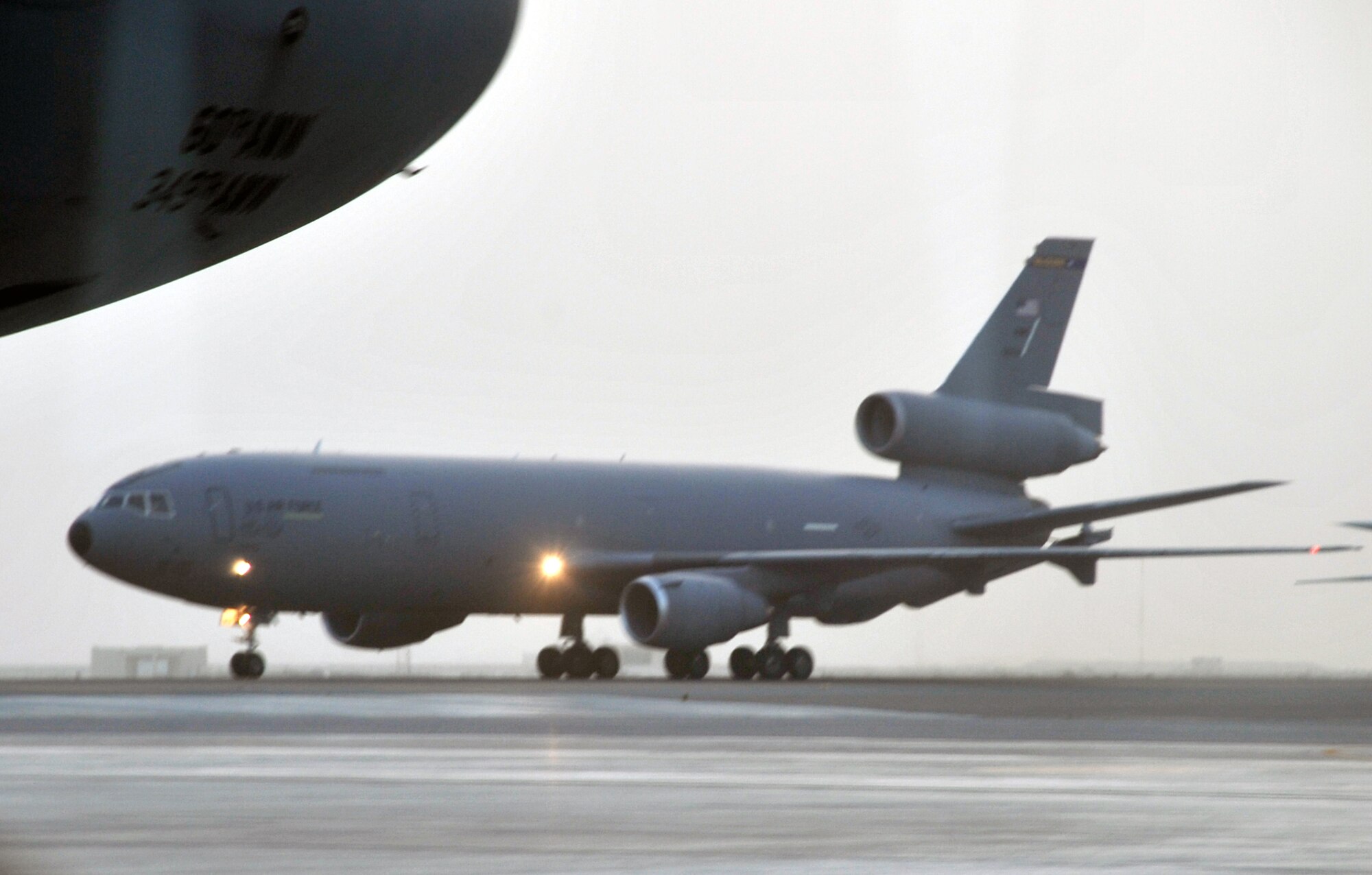 A KC-10 Extender is parked on the flightline for the 380th Air Expeditionary Wing at a non-disclosed base in Southwest Asia on April 24, 2010. KC-10s and the maintenance Airmen who support them deployed to the 380th AEW are a part of the 908th Expeditionary Air Refueling Squadron and the 380th Expeditionary Aircraft Maintenance Squadron and are deployed from Joint Base McGuire-Dix-Lakehurst, N.J., and Travis Air Force Base, Calif. (U.S. Air Force Photo/Master Sgt. Scott T. Sturkol/Released)