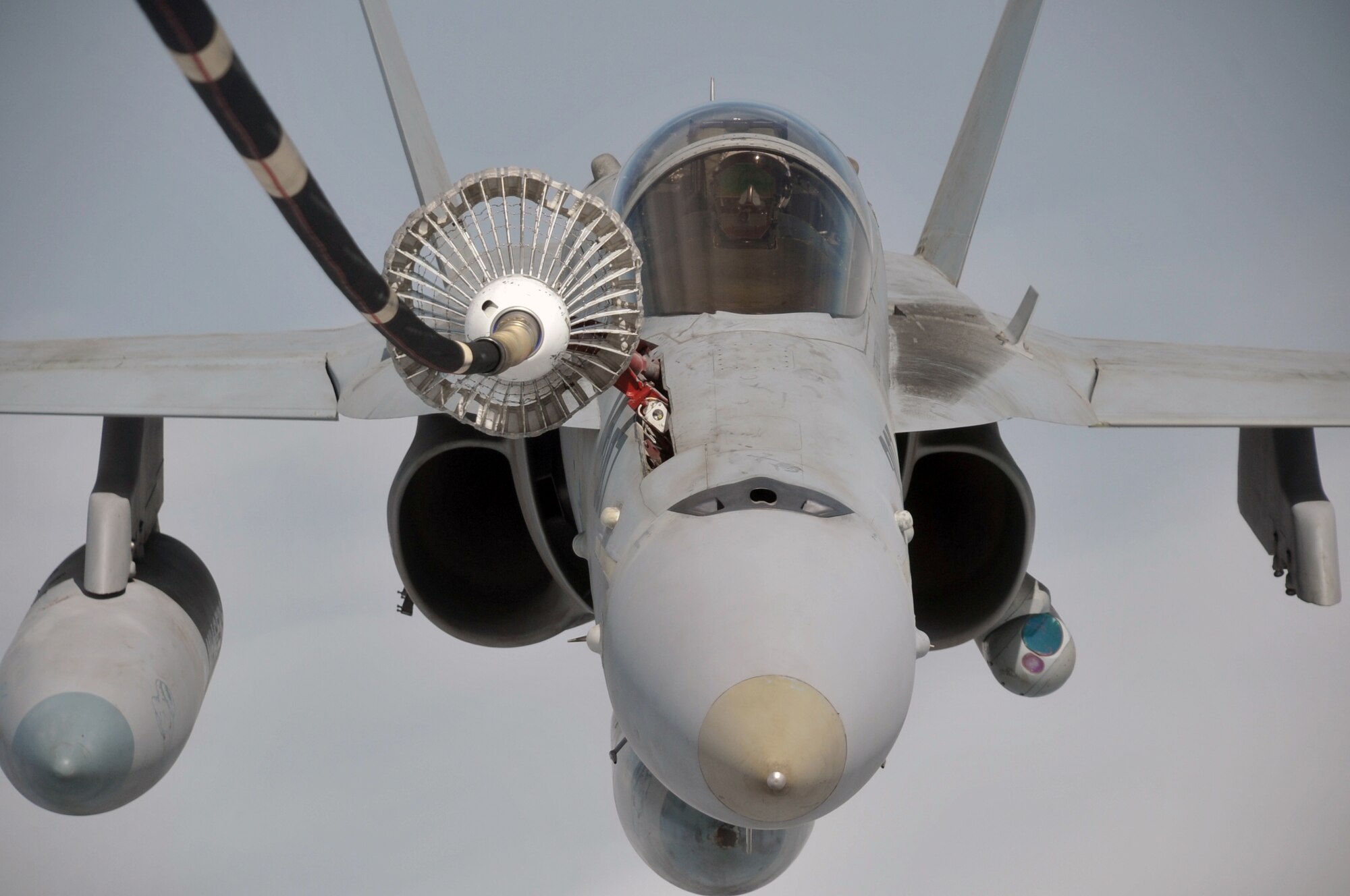 A U.S. Navy F-18 is refueled by a KC-10 Extender from the 908th Expeditionary Air Refueling Squadron during an air refueling mission in the U.S. Central Command area of responsibility on April 24, 2010. In the first three months of 2010, Airmen supporting the KC-10 deployed air refueling in the U.S. Central Command area of responsibility flew more than 1,000 sorties offl-loading more than 108 million pounds of fuel to more than 6,600 aircraft in support of combat operations. The 908th EARS, as part of the 380th Air Expeditionary Wing, supports operations Iraqi Freedom and Enduring Freedom and the Combined Joint Task Force-Horn of Africa. (U.S. Air Force Photo/Master Sgt. Scott T. Sturkol/Released)