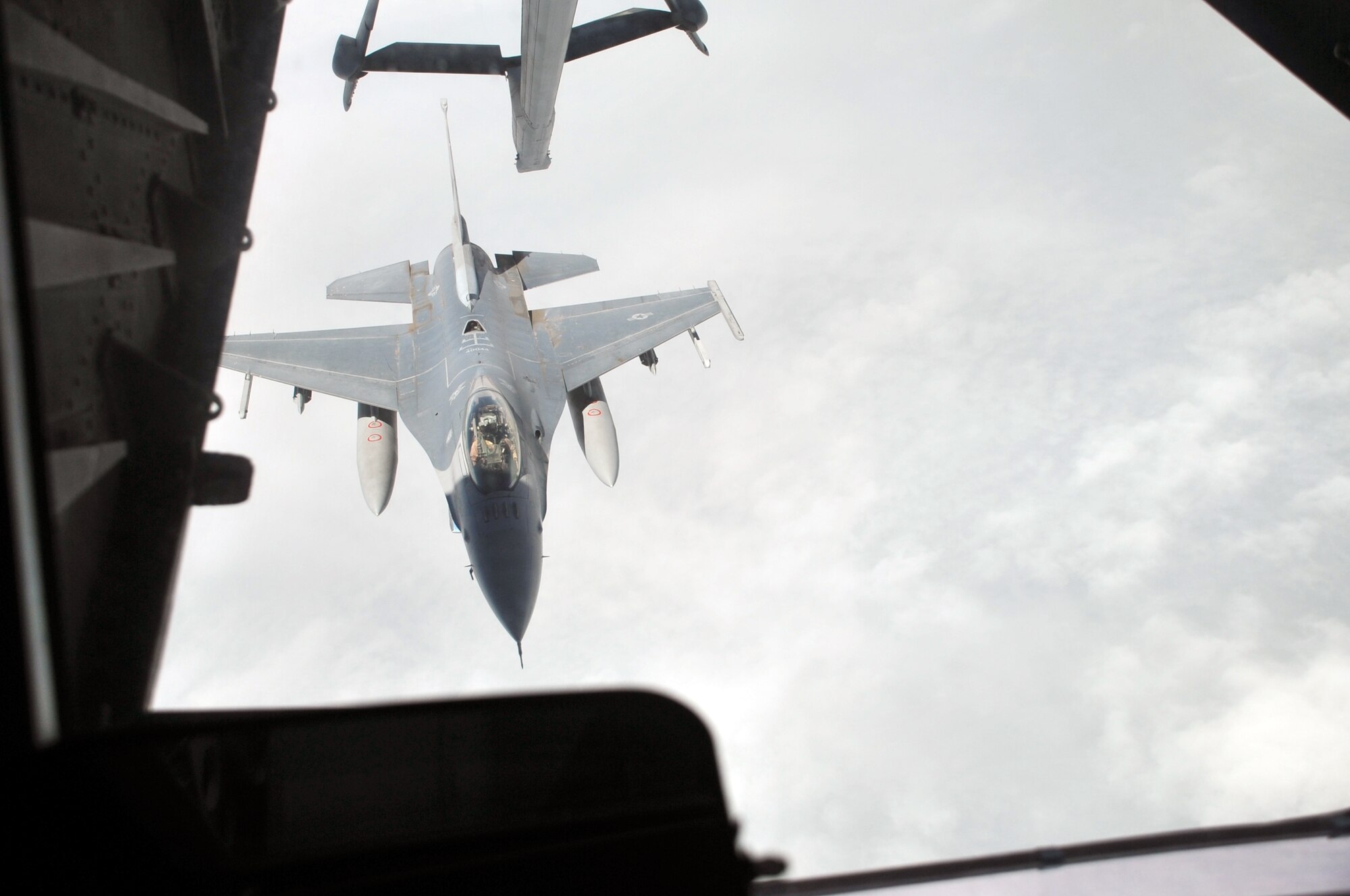 A U.S. Air Force F-16 Fighting Falcon is about to be refueled by a KC-10 Extender from the 908th Expeditionary Air Refueling Squadron during an air refueling mission in the U.S. Central Command area of responsibility on April 24, 2010. In the first three months of 2010, Airmen supporting the KC-10 deployed air refueling in the U.S. Central Command area of responsibility flew more than 1,000 sorties offl-loading more than 108 million pounds of fuel to more than 6,600 aircraft in support of combat operations. The 908th EARS, as part of the 380th Air Expeditionary Wing, supports operations Iraqi Freedom and Enduring Freedom and the Combined Joint Task Force-Horn of Africa. (U.S. Air Force Photo/Master Sgt. Scott T. Sturkol/Released)