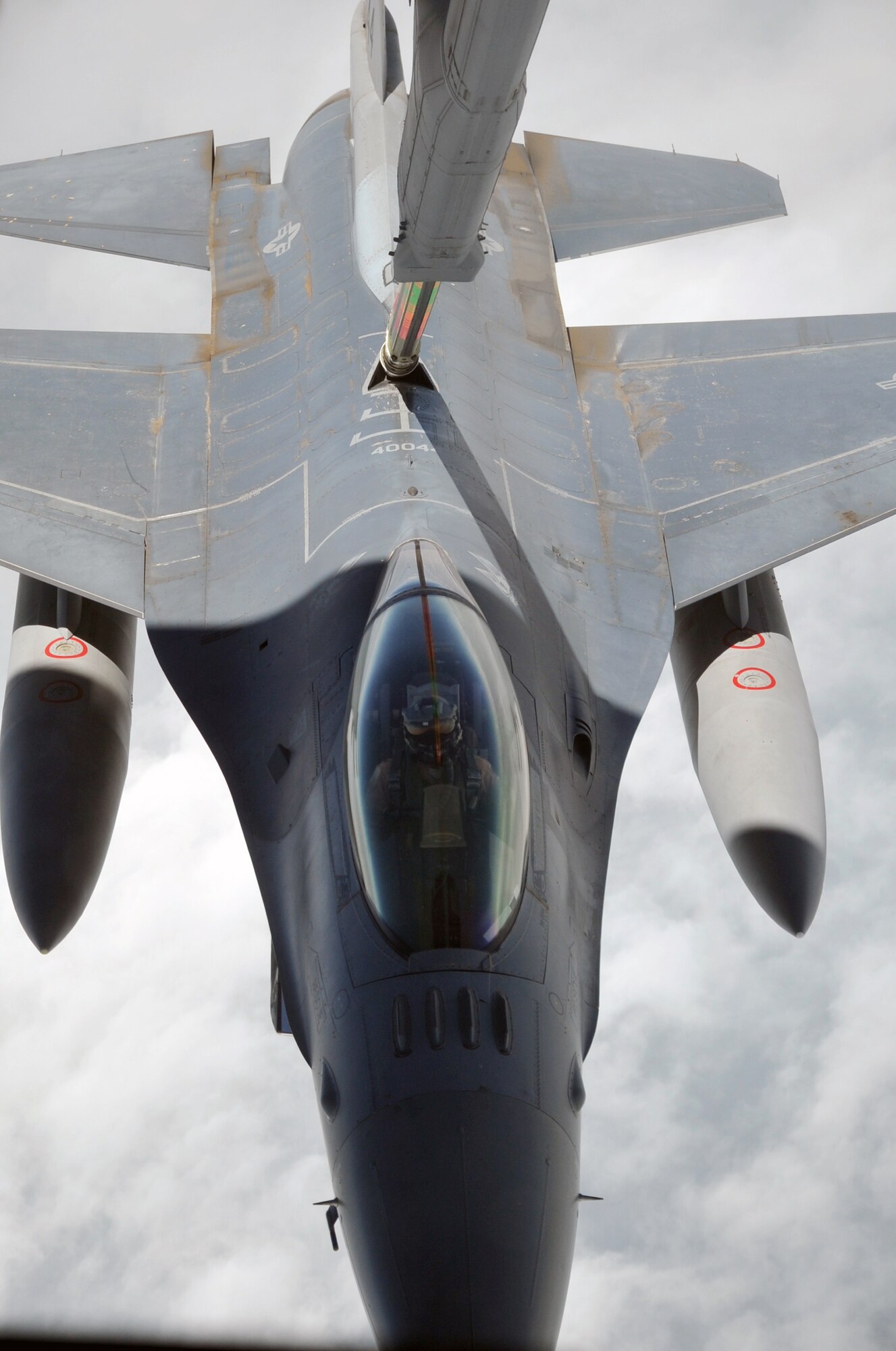 A U.S. Air Force F-16 Fighting Falcon is refueled by a KC-10 Extender from the 908th Expeditionary Air Refueling Squadron during an air refueling mission in the U.S. Central Command area of responsibility on April 24, 2010. In the first three months of 2010, Airmen supporting the KC-10 deployed air refueling in the U.S. Central Command area of responsibility flew more than 1,000 sorties offl-loading more than 108 million pounds of fuel to more than 6,600 aircraft in support of combat operations. The 908th EARS, as part of the 380th Air Expeditionary Wing, supports operations Iraqi Freedom and Enduring Freedom and the Combined Joint Task Force-Horn of Africa. (U.S. Air Force Photo/Master Sgt. Scott T. Sturkol/Released)