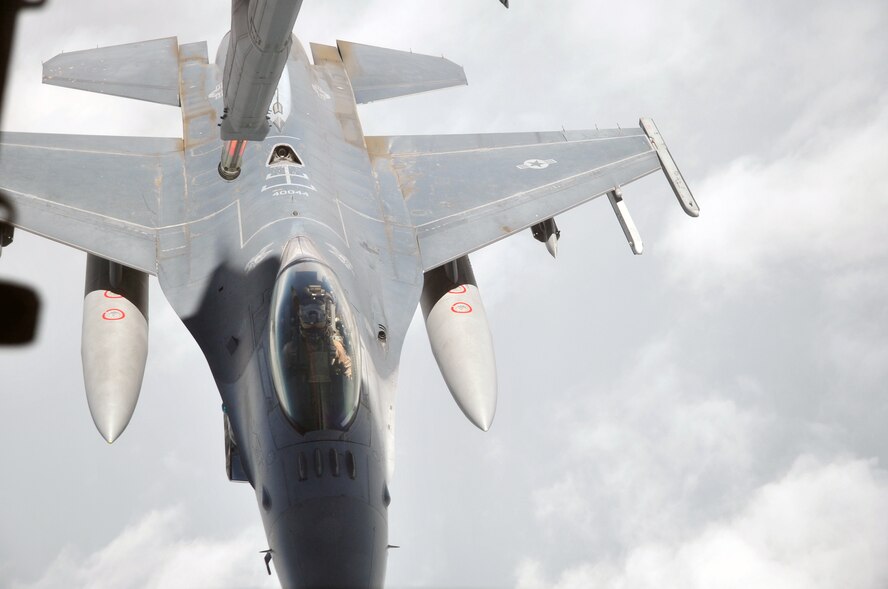 A U.S. Air Force F-16 Fighting Falcon is about to be refueled by a KC-10 Extender from the 908th Expeditionary Air Refueling Squadron during an air refueling mission in the U.S. Central Command area of responsibility on April 24, 2010. In the first three months of 2010, Airmen supporting the KC-10 deployed air refueling in the U.S. Central Command area of responsibility flew more than 1,000 sorties offl-loading more than 108 million pounds of fuel to more than 6,600 aircraft in support of combat operations. The 908th EARS, as part of the 380th Air Expeditionary Wing, supports operations Iraqi Freedom and Enduring Freedom and the Combined Joint Task Force-Horn of Africa. (U.S. Air Force Photo/Master Sgt. Scott T. Sturkol/Released)