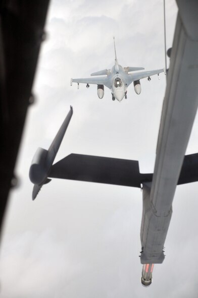 A U.S. Air Force F-16 Fighting Falcon is about to be refueled by a KC-10 Extender from the 908th Expeditionary Air Refueling Squadron during an air refueling mission in the U.S. Central Command area of responsibility on April 24, 2010. In the first three months of 2010, Airmen supporting the KC-10 deployed air refueling in the U.S. Central Command area of responsibility flew more than 1,000 sorties offl-loading more than 108 million pounds of fuel to more than 6,600 aircraft in support of combat operations. The 908th EARS, as part of the 380th Air Expeditionary Wing, supports operations Iraqi Freedom and Enduring Freedom and the Combined Joint Task Force-Horn of Africa. (U.S. Air Force Photo/Master Sgt. Scott T. Sturkol/Released)