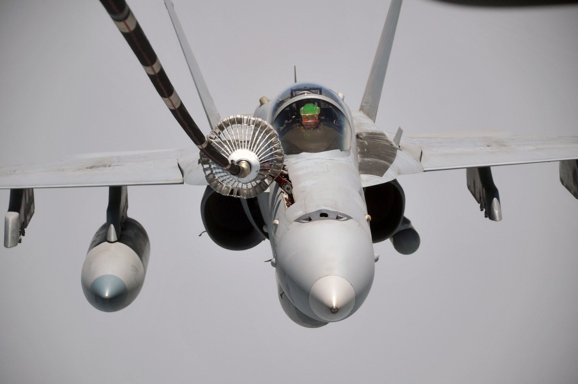 A U.S. Navy F-18 is refueled by a KC-10 Extender from the 908th Expeditionary Air Refueling Squadron during an air refueling mission in the U.S. Central Command area of responsibility on April 24, 2010. In the first three months of 2010, Airmen supporting the KC-10 deployed air refueling in the U.S. Central Command area of responsibility flew more than 1,000 sorties offl-loading more than 108 million pounds of fuel to more than 6,600 aircraft in support of combat operations. The 908th EARS, as part of the 380th Air Expeditionary Wing, supports operations Iraqi Freedom and Enduring Freedom and the Combined Joint Task Force-Horn of Africa. (U.S. Air Force Photo/Master Sgt. Scott T. Sturkol/Released)