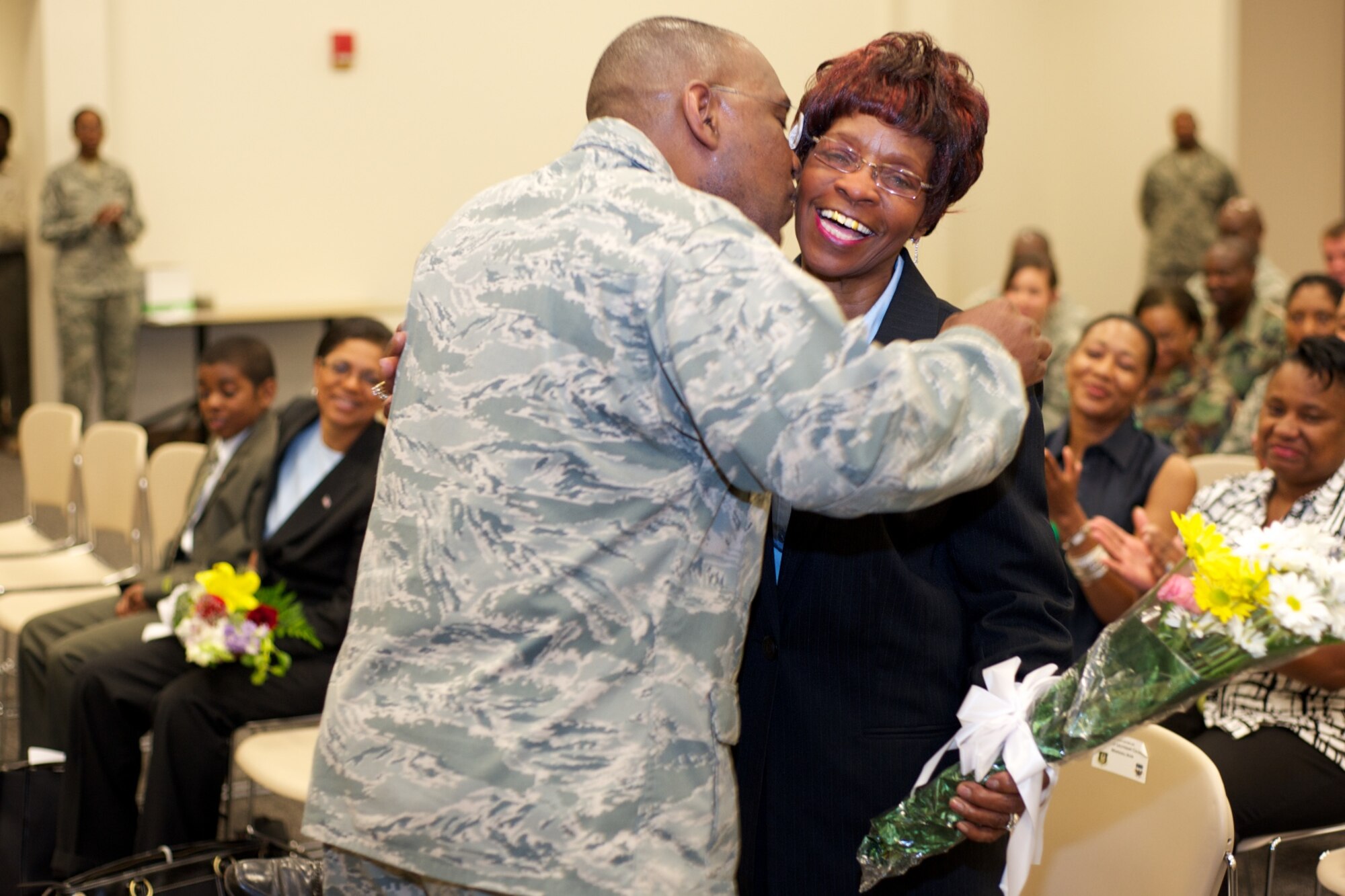 Lt. Col. Marshall Irving thanks his mother for all the hard work she did in raising him over the years. Colonel Irving assumed command of the 403rd Maintenance Support Group Saturday of the May Unit Training Assembly. Family and friends of Colonel Irving attended the ceremony, held at the wing's Consolidated Aircraft Maintenance Facility.