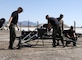 Members of the 109th Air Control Squadron prepare for Operation Big Crow in Wendover, Utah on April 24.  Master Sgt. David Weber, Master Sgt. Brian Carter, Staff Sgt. Jeremy Whisman, and Staff Sgt. Jared Rich are working on the assembly of the TSC-179 satellite antenna in support of the operation.  (U.S. Air Force photo by Technical Sgt. Kelly Collett)	