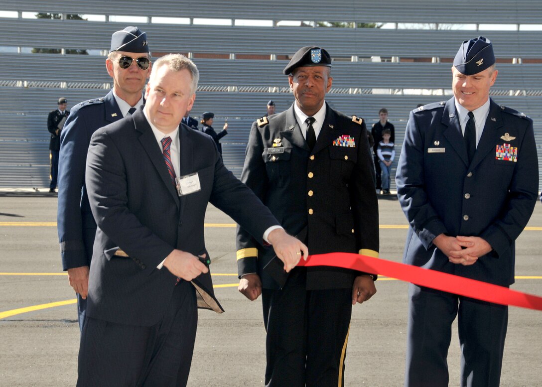 Westfield’s Mayor Dan Knapik cuts the ribbon for the new fire station.
