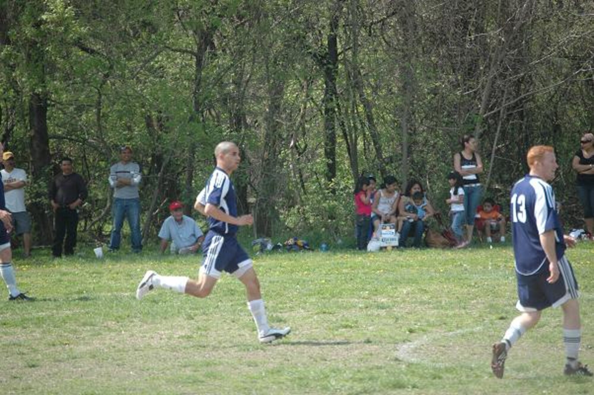 Senior Airman Jason Harris plays for the Whiteman Air Force Base soccer team with members from the 509th.  Airman Harris embraced Total Force Integration after relocating to Whiteman by joining the active duty team.  (Photo provided by Security Forces Squadron)