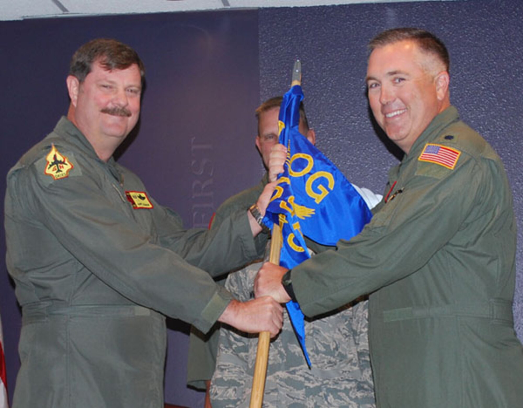 Lt. Col. Richard Peterson accepts command of the 507th Operations Support Flight on April 10, 2010 from Col. Gregory Gilmour. Peterson was the former director of Operations, 465th Air Refueling Squadron. Peterson received his commission from
Officer Training School after graduating from the University of Texas, Austin. Peterson is a Command Pilot with more than 2,700 military flying hours,
including combat in Bosnia, and 7,200 civilian. He has flown the T-37, T-38, A-
10 and KC-135R.