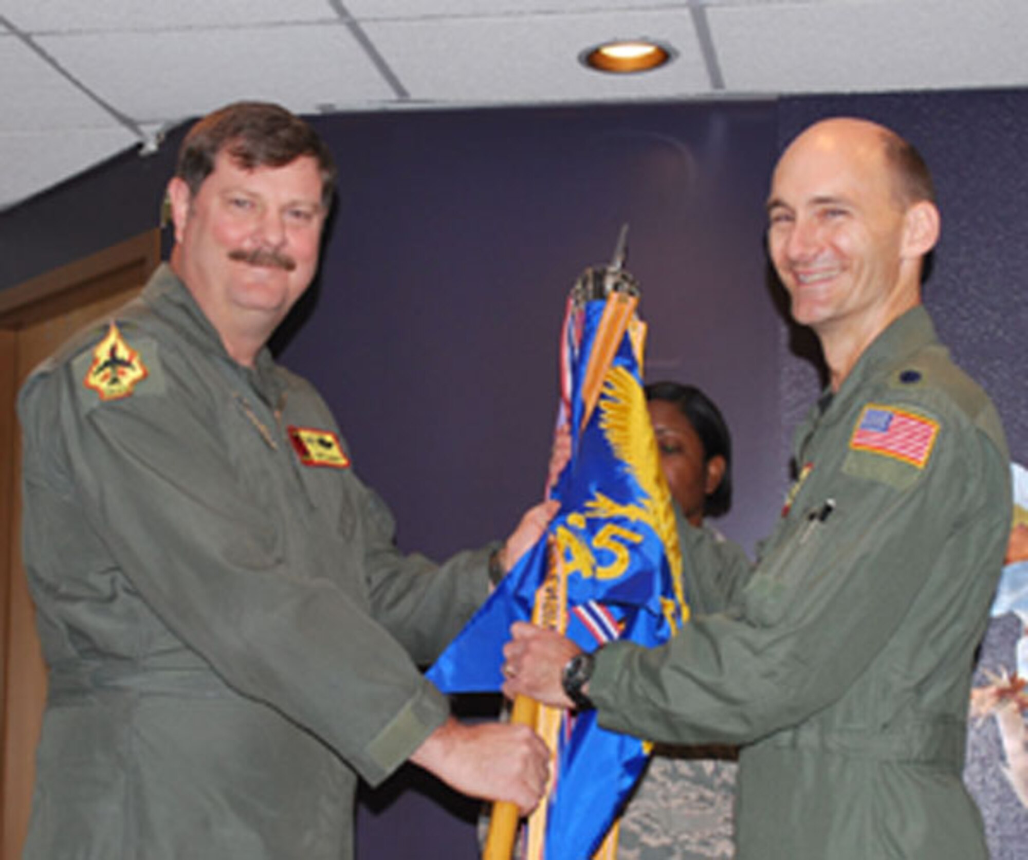 Lt. Col. Thomas Hudnall accepts command of the 465th Air Refueling Squadron on April 10, 2010 from Col. Gregory Gilmour, 507th Operations Group commander.
Hudnall was the former commander of the 507th Operations Support Flight. Hudnall entered the Air Force as a graduate of Louisiana State University’s ROTC program in
1988. He joined the Air Force Reserve in 1997 and is a Command Pilot with more than 4,300 hours, including over 1,000 in combat and combat support. He has flown the T-37, T-38, EC-135Y/N and the KC-135 aircraft. 
