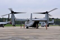 U. S. Marines of 2nd Marine Air Wing, Cherry Point, N.C., prepare MV22B Ospreys for a flight to Boston, Mass. in support of Marine Week Boston on May 3, 2010. Marine Week Boston provides an opportunity to increase public awareness of the Marine Corps' value to our nation's defense and to preserve and mature the Corps' relationship with the American people. (Official U. S. Marine Corps photo by Lance Cpl. Sean Palmer)