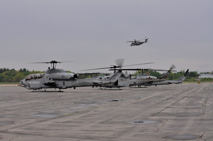 HANSCOM AIRFORCE BASE, MASS - U. S. Marines of 2nd Marine Air Wing, Cherry Point, N.C., prepare AH-1 HueyCobras for a flight to Boston, Mass. in support of Marine Week Boston on May 3, 2010. Marine Week Boston provides an opportunity to increase public awareness of the Marine Corps' value to our nation's defense and to preserve and mature the Corps' relationship with the American people. (Official U. S. Marine Corps photo by Lance Cpl. Sean Palmer)