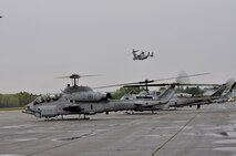 U. S. Marines of 2nd Marine Air Wing, Cherry Point, N.C., prepare AH-1 HueyCobras for a flight to Boston, Mass. in support of Marine Week Boston on May 3, 2010. Marine Week Boston provides an opportunity to increase public awareness of the Marine Corps' value to our nation's defense and to preserve and mature the Corps' relationship with the American people.