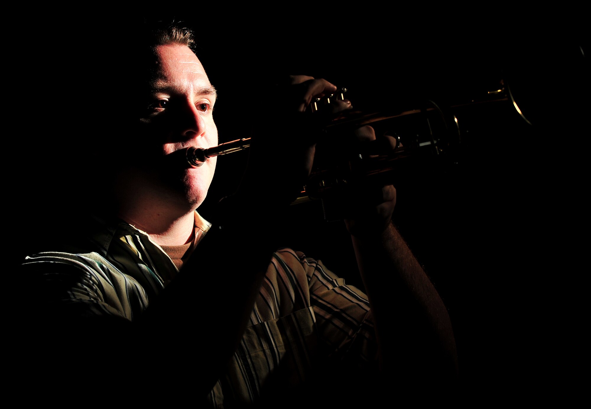 Senior Airman Christopher Cacopardo, 18th Aircraft Maintenance Squadron, was recently seleted as a trumpet player for the 210 Tops in Blue team. Tops in Blue is the Air Force's premier expeditionary entertainment unit consisting of active-duty Air Force members who provide quality entertainment to Airmen and their families stationed worldwide at remote and deployed locations. (U.S. Air Force photo/ Tech. Sgt. Rey Ramon)