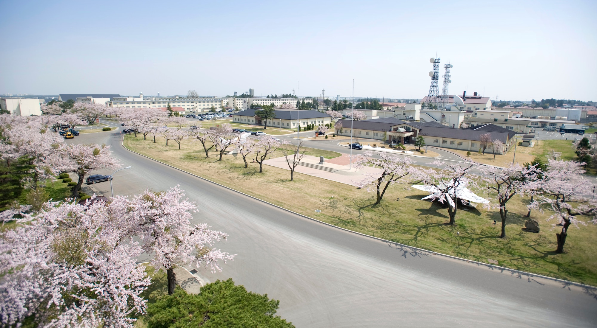 MISAWA AIR BASE, Japan -- Cherry blossoms bloom in Risner Circle May 4. Cherry blossoms, known as sakura in the Japanese language, provide a unique landscaping element to the base and take a prominent position in Japanese culture. (U.S. Air Force photo/Staff Sgt. Chad C. Strohmeyer)
