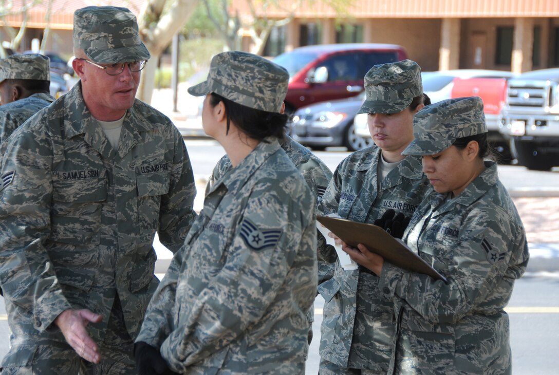 Senior Airman Matthew Samuelson briefs fellow airmen during a services exercise here at the 161st Air Refueling Wing, Phoenix, May 1, 2010. Providing hands-on experience solidifies the learning process for Services troops preparing them for deployment and emergency situations. (U.S. Air Force Photo by Senior Airman Nicole Enos)