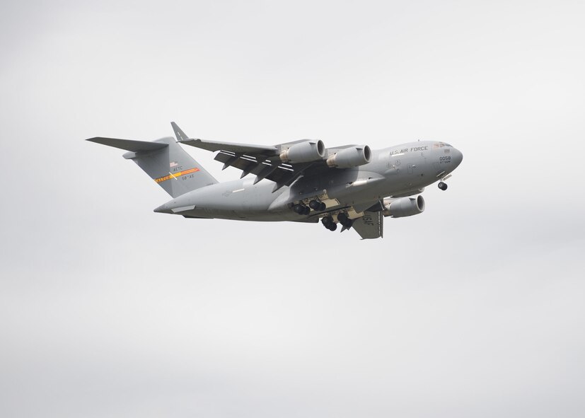 DYESS AIR FORCE BASE, Texas-- A C-17 Globemaster III, from Altus Air Force Base, Okla. , performs over the heads of spectators for the Dyess Big Country Airfest here May 1. The airfest is held every other year on Dyess Air Force Base and features various aircraft performing as well as static displays. The airfest is held to bring the Abilene and Dyess communities together to demonstrate the capabilities of the Air Force. (U.S Air Force photo/ Airman 1st Class Shannon Hall)