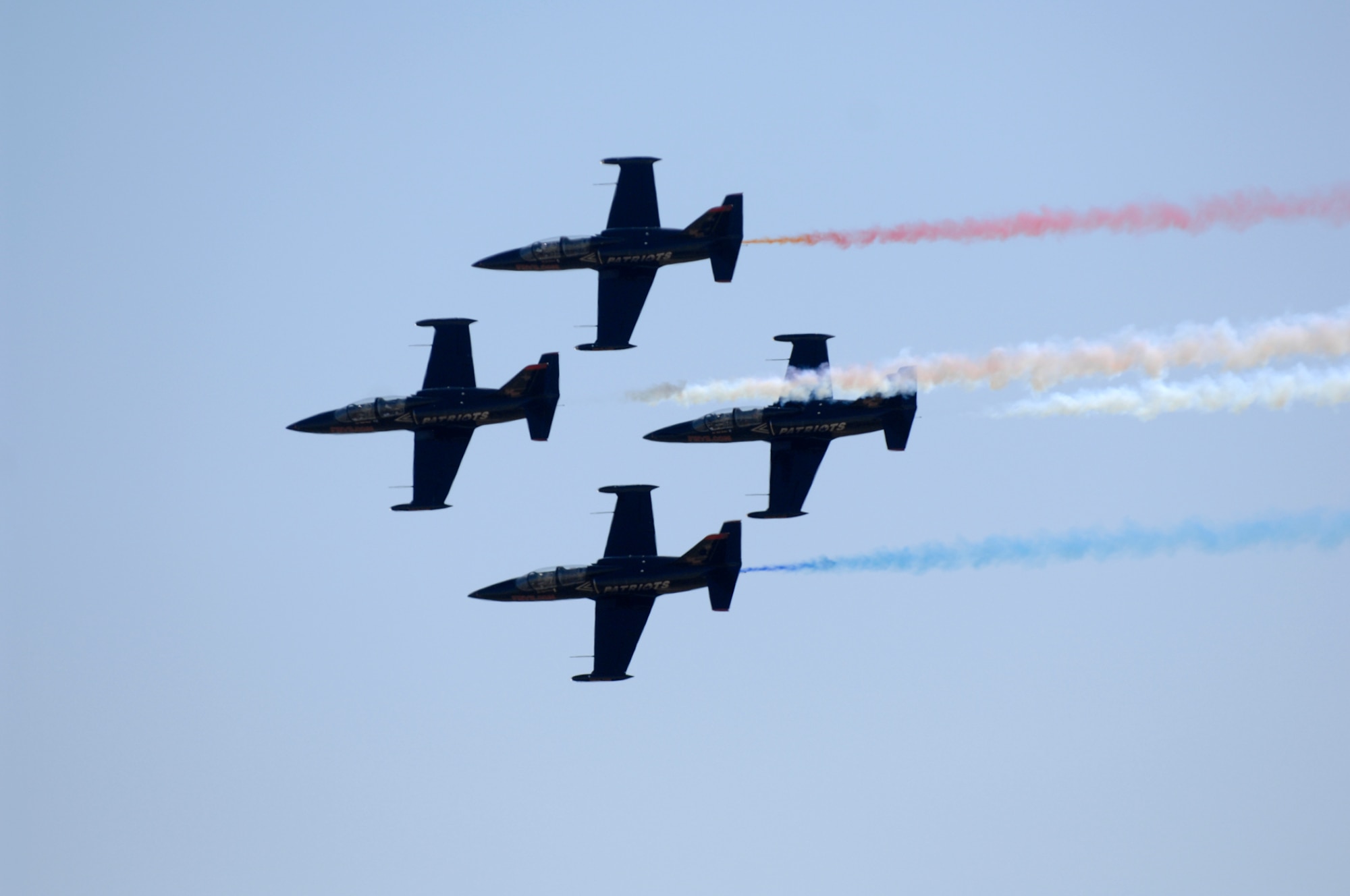 The Patriots Jet Team L-39s fly in formation at the March Field AirFest, March Air Reserve Base, Calif., May 2, 2010. The AirFest is a bi-annual, two-day event featuring military and civilian aerial performances and static displays of modern and historic aircraft.  (U.S. Air Force photo by Senior Airman Matthew Smith/released)