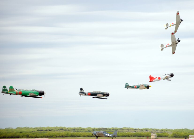 DYESS AIR FORCE BASE, Texas-- The Tora! Tora! Tora! perform a World War II reenactment for spectators during the Dyess Big Country Airfest, here May 1. The airfest is held every other year on Dyess Air Force Base and features various aircraft performing as well as static displays. The airfest is held to bring the Abilene and Dyess communities together to demonstrate the capabilities of the Air Force.(U.S. Air Force photo/ Airman 1st Class Brittney Prescott)