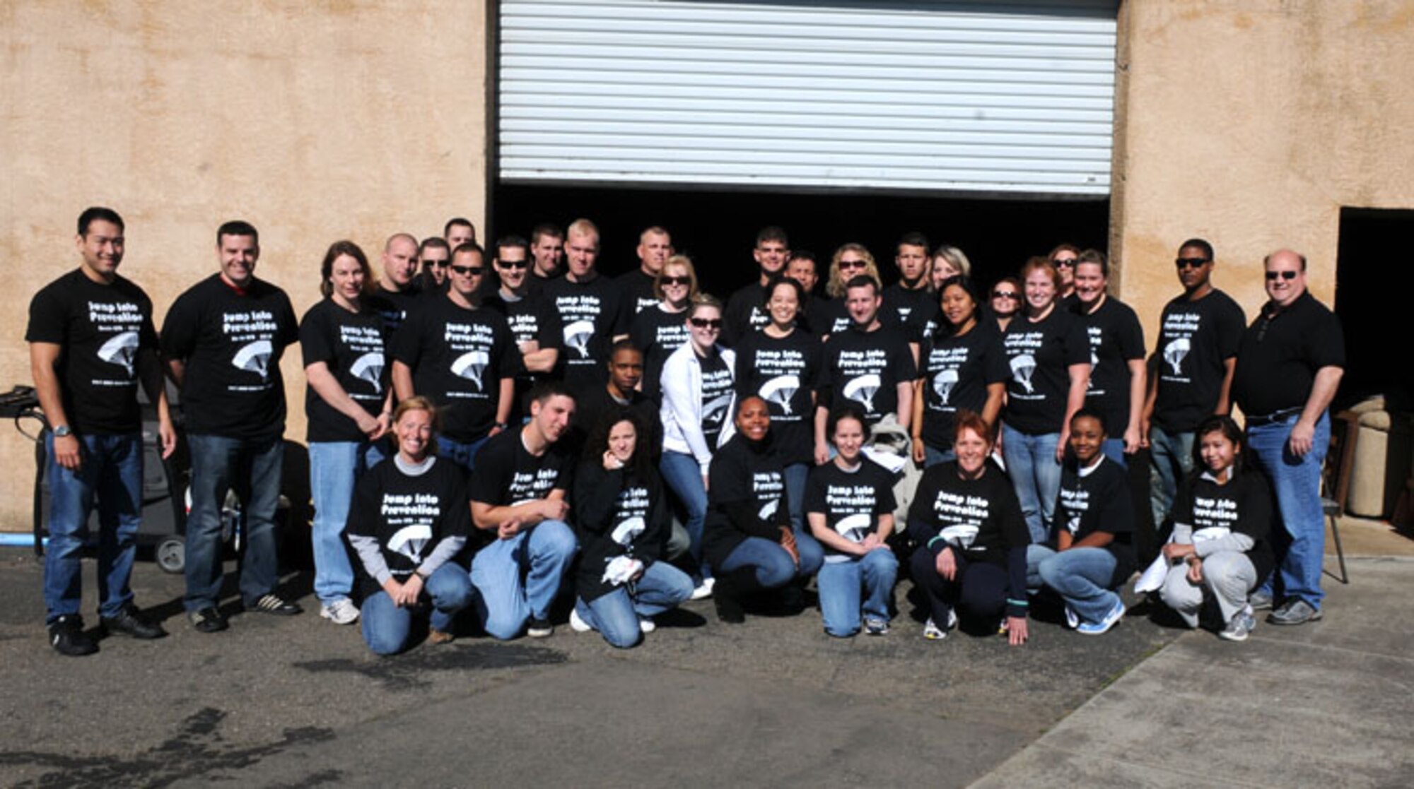 Beale Airmen pose for a group photo prior to skydiving as part of Sexual Assault Awareness month, April 30 at Lincoln Regional Airport. The skydiving event was coordinated by Dr. Michael Stacy, Beale’s Sexual Assault Response Coordinator. (Air Force photo by Airman 1st Class David Tracy)