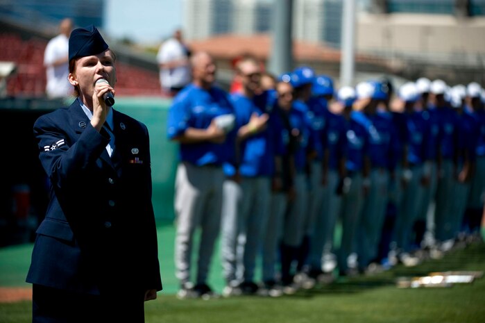 LAS VEGAS --  Airman 1st Class Kryzdy Ferguson, 18th Reconnaissance Squadron, sensor operator, sings The National Anthem at the University of Nevada, Las Vegas  Earl E. Wilson, baseball stadium May 1, 2010.   UNLV declared the weekend, Air Force weekend and offered free admission for all active duty during the Air Force Academy, UNLV baseball games. (U.S. Air Force Photo by Airman 1st Class Brett Clashman)