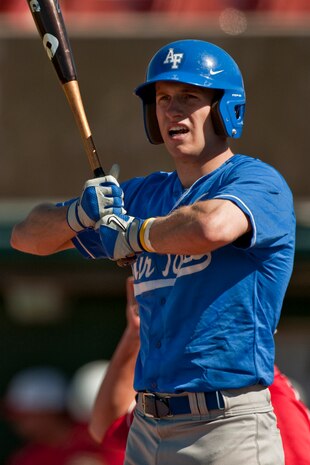 LAS VEGAS --   Alex Bast a freshman  from the U.S. Air Force Academy "Falcons" looks down toward the third base coach for a sign before stepping into the batters box during a Saturday afternoon game against the University of Nevada, Las Vegas (UNLV)"Rebels,"  at Earl E. Wilson Stadium, in Las Vegas May 1, 2010. UNLV declared the weekend, Air Force weekend and offered free admission for all active duty during the Air Force Academy, UNLV baseball games.  (U.S. Air Force photo by Tech. Sgt. Michael R. Holzworth)