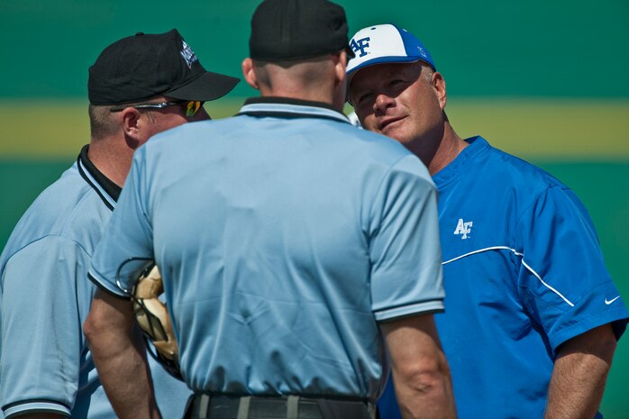 LAS VEGAS --  Mike Hutcheon the U.S. Air Force Academy "Falcons" head coach discusses a disputed call with the umpires during a Saturday afternoon game against the University of Nevada, Las Vegas "Rebels," at Earl E. Wilson Stadium, in Las Vegas May 1, 2010. (U.S. Air Force photo by Tech. Sgt. Michael R. Holzworth)