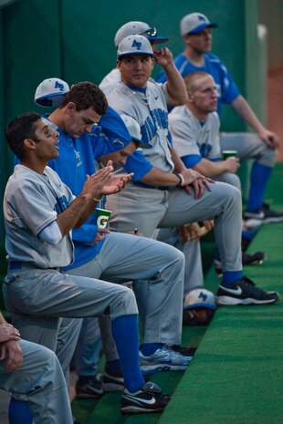 LAS VEGAS --  U.S. Air Force Academy "Falcons" cheer on their teammates from the dugout during a late afternoon game against the University of Nevada, Las Vegas "Rebels,"  at Earl E. Wilson Stadium, in Las Vegas April 30, 2010.  UNLV declared the weekend, Air Force weekend and offered free admission for all active duty during the Air Force Academy vs. UNLV baseball games.  (U.S. Air Force photo by Tech. Sgt. Michael R. Holzworth)