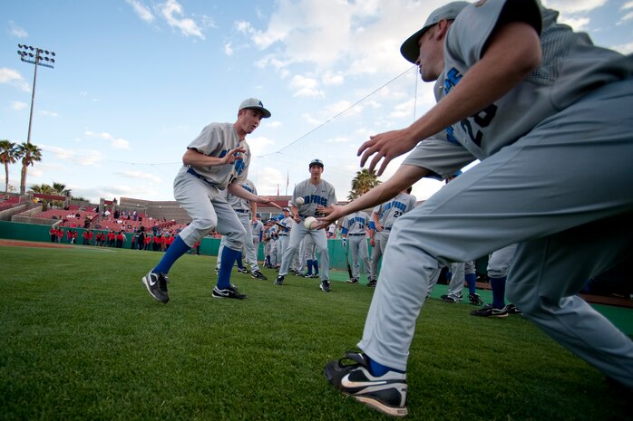 LAS VEGAS --  U.S. Air Force Academy "Falcons" play a quick game of "Hot Potato" before a late afternoon game against the University of Nevada, Las Vegas "Rebels," at Earl E. Wilson Stadium, in Las Vegas April 30, 2010.  UNLV declared the weekend, Air Force weekend and offered free admission for all active duty during the Air Force Academy, UNLV baseball games.  (U.S. Air Force photo by Tech. Sgt. Michael R. Holzworth)