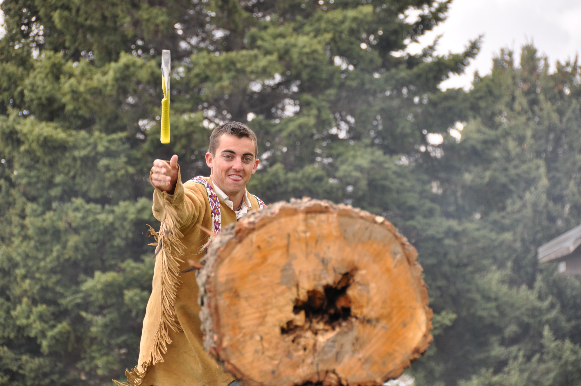 Staff Sgt. Christopher McNichols, 67th Aerial Port Squadron, practices his hatchet throwing skills during the wing’s Family Day May 2. The wing held the event to allow family members to relax together at the park. (U.S. Air Force photo/Staff Sgt. Kyle Brasier)