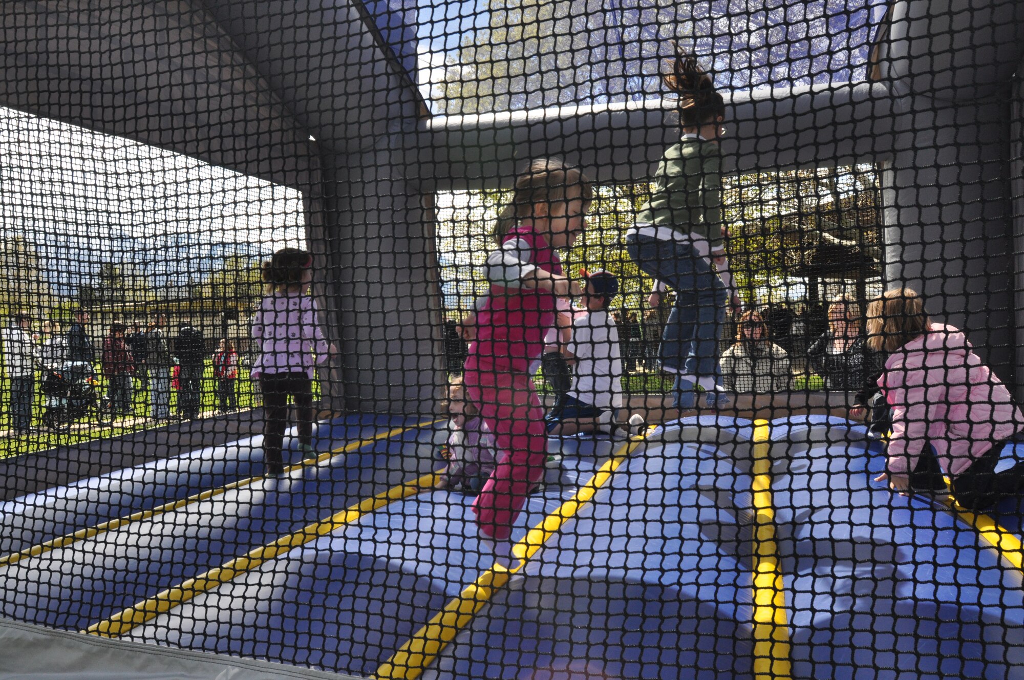 Children enjoy the bouncy castle during the 419th Fighter Wing’s Family Day festivities May 2. (U.S. Air Force photo/Staff Sgt. Alan Schultz)