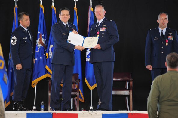 PATRICK AIR FORCE BASE, Fla. -- Maj. Gen. Frank J. Padilla, 10th Air Force Commander, presented the Legion of Merit Medal to both Colonel Kirkpatrick and Colonel Dunn during their May 2 Change of Command Ceremony here. Colonel Dunn was previously the Commander of the 943rd Rescue Group at Davis-Monthan AFB, Ariz., one of the 920th Geographically Separated Units (GSU.) Colonel Kirkpatrick now begins his new job as the senior Air Force Reserve Adviser to the Commander of U.S. Special Operations Command at MacDill AFB, Fla. (U.S. Air Force photo/Master Sgt. Rob Grande)