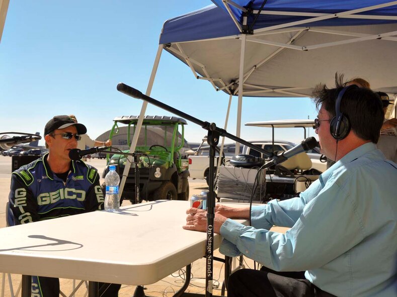 Tim Weber, GEICO Extra 300 pilot, responds to questions during a radio interview at the March Field AirFest at March Air Reserve Base, May 1, 2010.  Local radio stations present at the two-day, bi-annual event interviewed 14 AirFest performers.  (U.S. Air Force photo/1st Lt. Zach Anderson)
