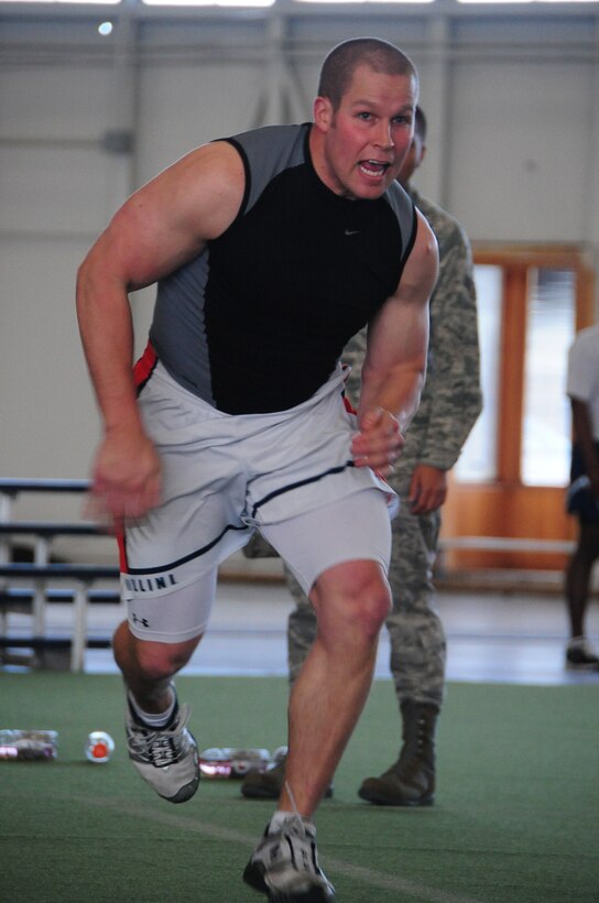 ELLSWORTH AIR FORCE BASE, S.D. – 2nd Lt. Austin Dowling, 28th Comptroller Contracting Squadron financial analyst, sprints down a field during the Iron Flight competition, April 29.  Lieutenant Dowling was part of a four-person team, competing against three other teams. (U.S. Air Force photo/Airman 1st Class Anthony Sanchelli)