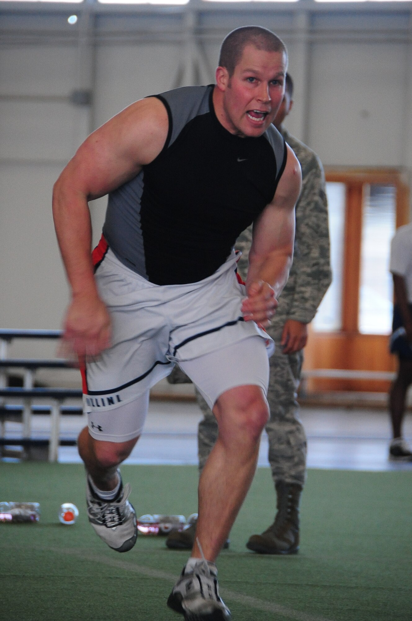 ELLSWORTH AIR FORCE BASE, S.D. – 2nd Lt. Austin Dowling, 28th Comptroller Contracting Squadron financial analyst, sprints down a field during the Iron Flight competition, April 29.  Lieutenant Dowling was part of a four-person team, competing against three other teams. (U.S. Air Force photo/Airman 1st Class Anthony Sanchelli)