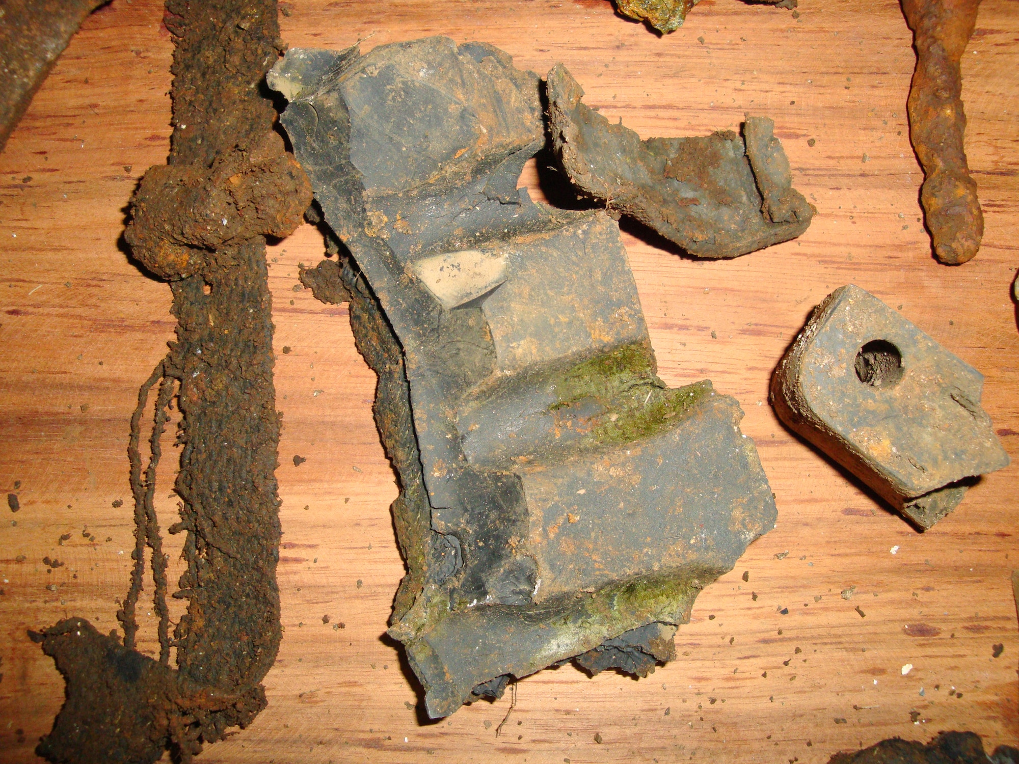 Part of a World War II jeep's tire tread found April 6, 2010, in Tacloban, Philippines. During a Moore's Marauders mission to find six servicemembers designated as "missing in action," local guides dug through a foot of mud to recover various pieces from the site. This tire tread was the only affirmation the crew got that the site they found was indeed the one of the C-47 Skytrain that went down while delivering supplies to guerilla forces. (Courtesy photo/Senior Master Sgt. Thomas Niznik)